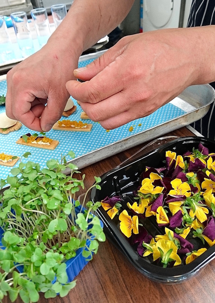 Plating up the canapés for a tasting at lunchtime.