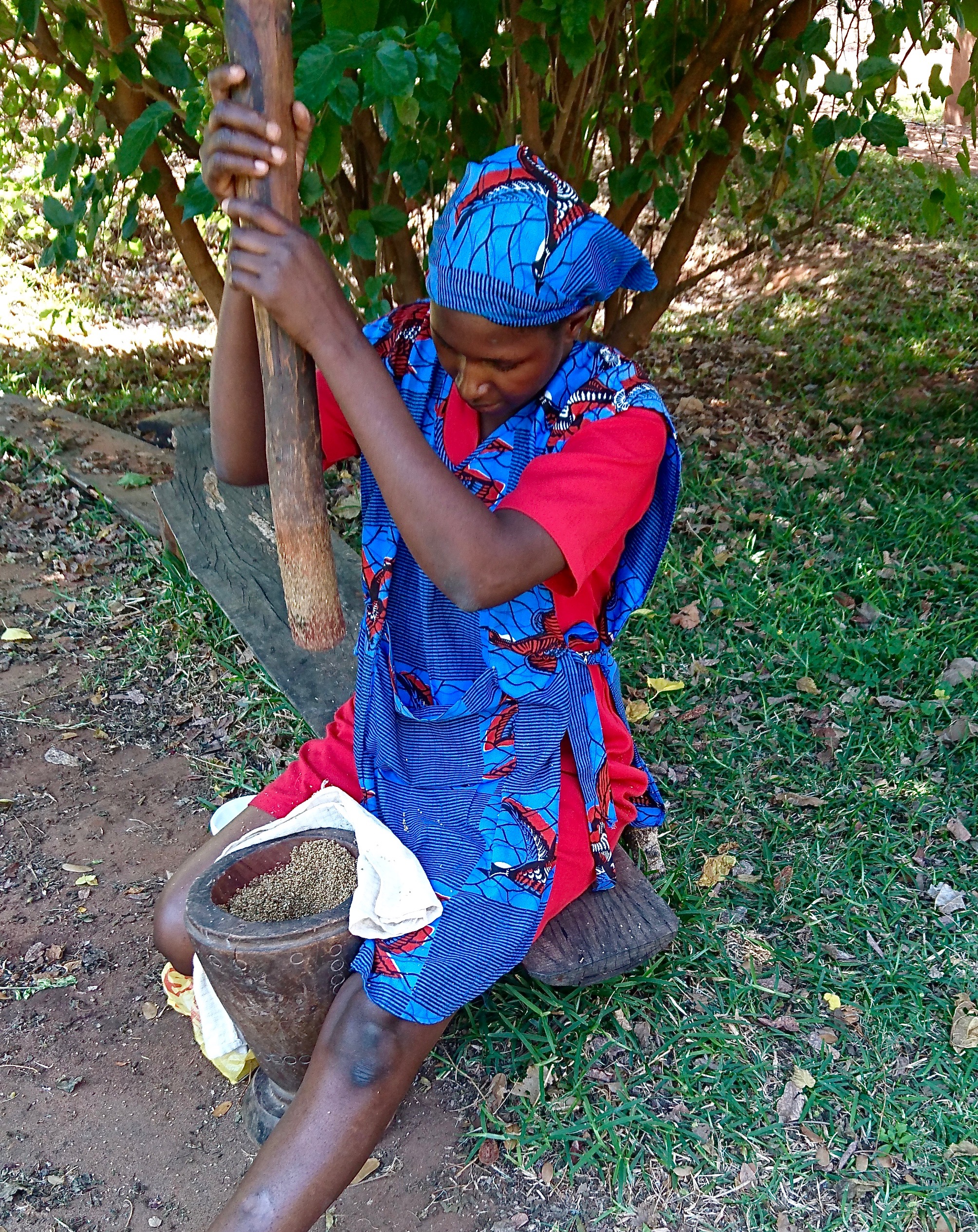 recipe-testing-sandra-libetwe-showing-me-how-to-dehusk-the-nzembwe-finger-millet